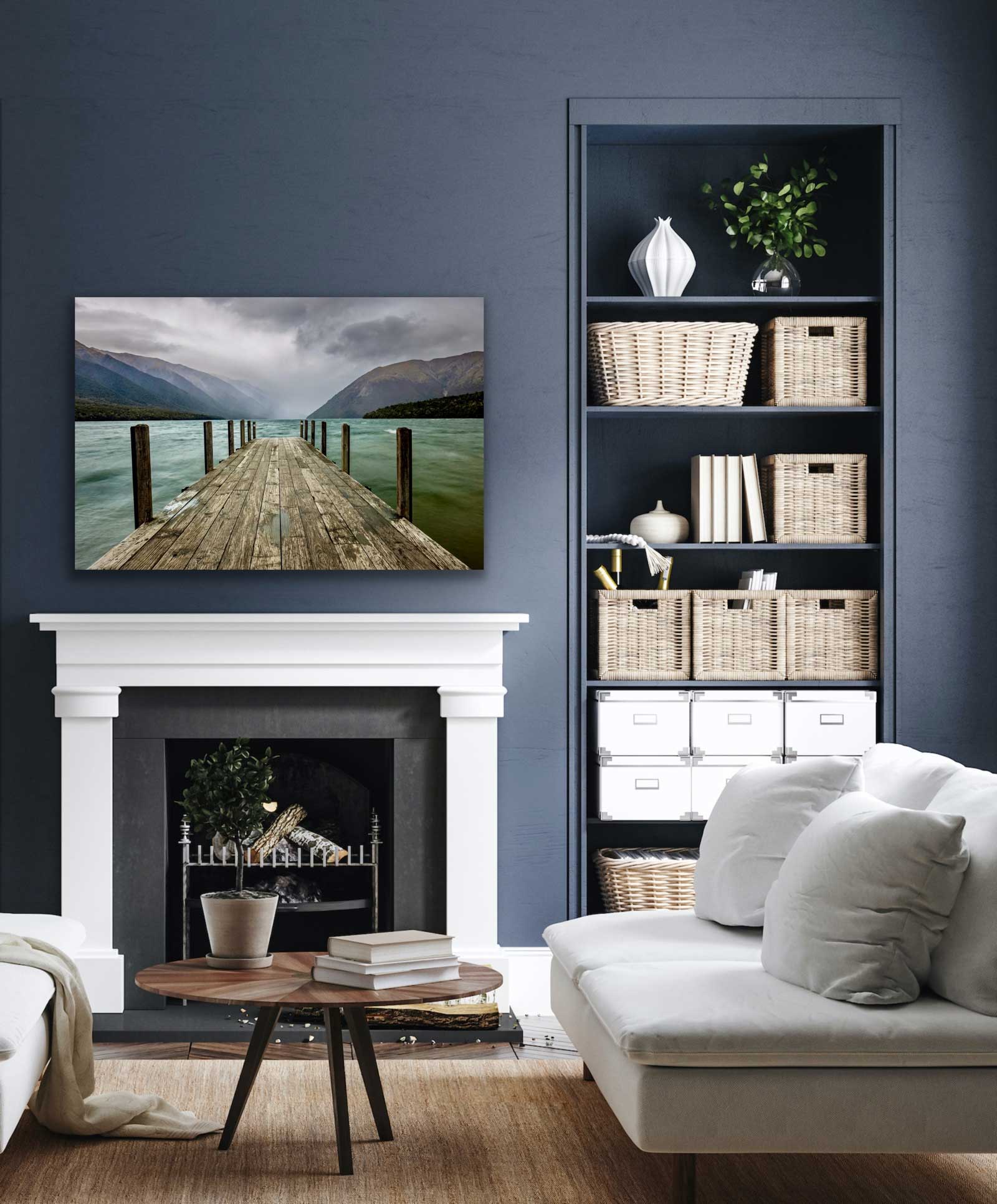 Lake Rotoiti landscape photograph hung on the wall above a fireplace. See this beautiful brown, green, and grey tone photograph in situ.