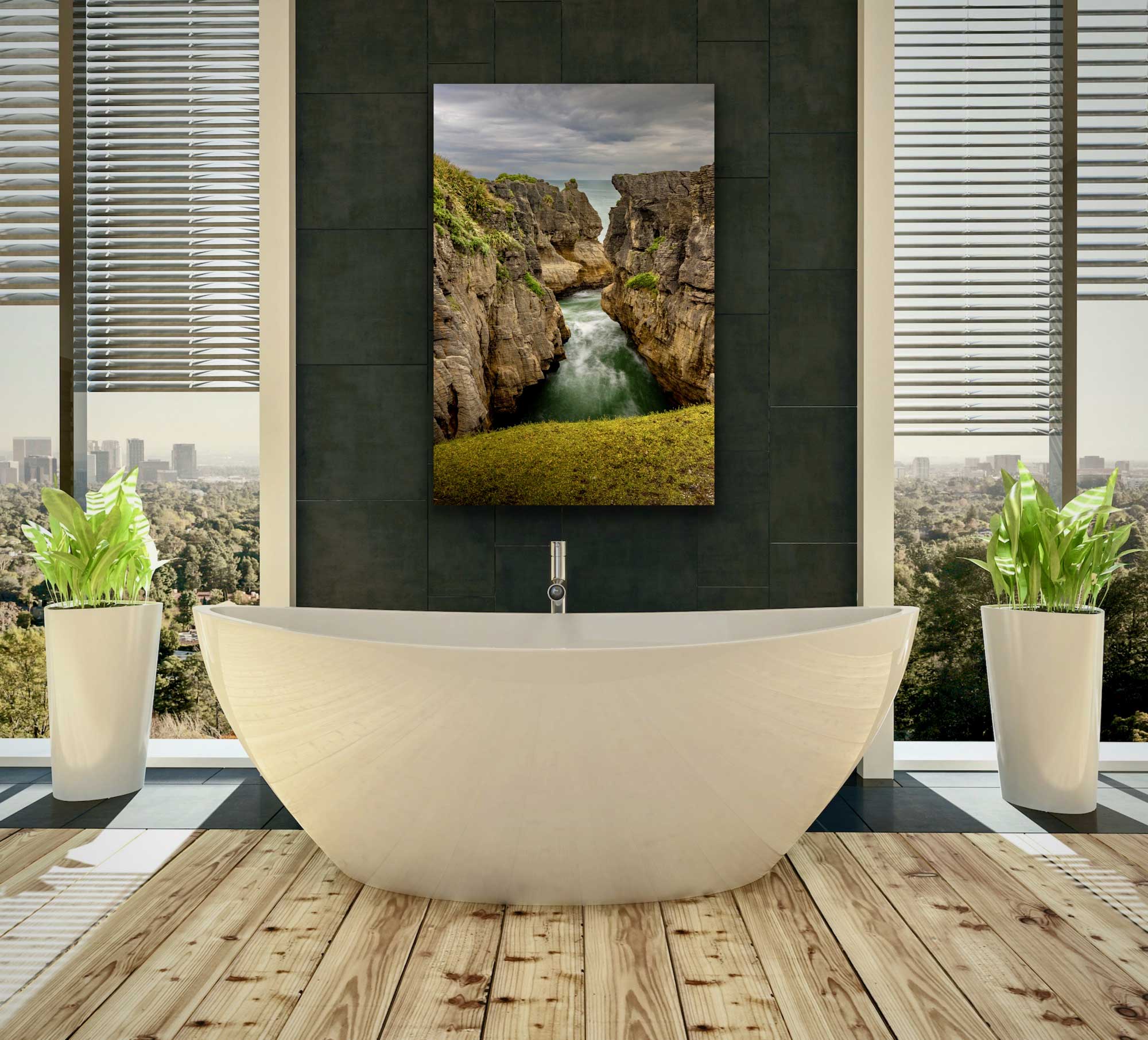 Punakaiki surge pool portrait photograph hung above a bath tub. Beautiful in situ landscape photography. Interior design New Zealand.