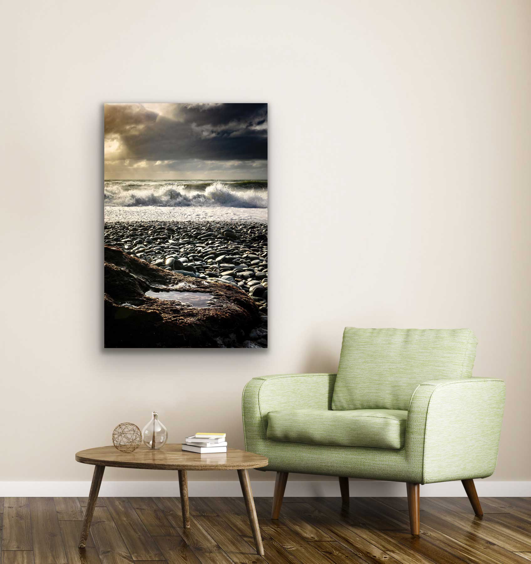 Rugged West Coast beach photograph in situ, hung on the wall above a chair and coffee table. NZ beach and landscape interior design art.