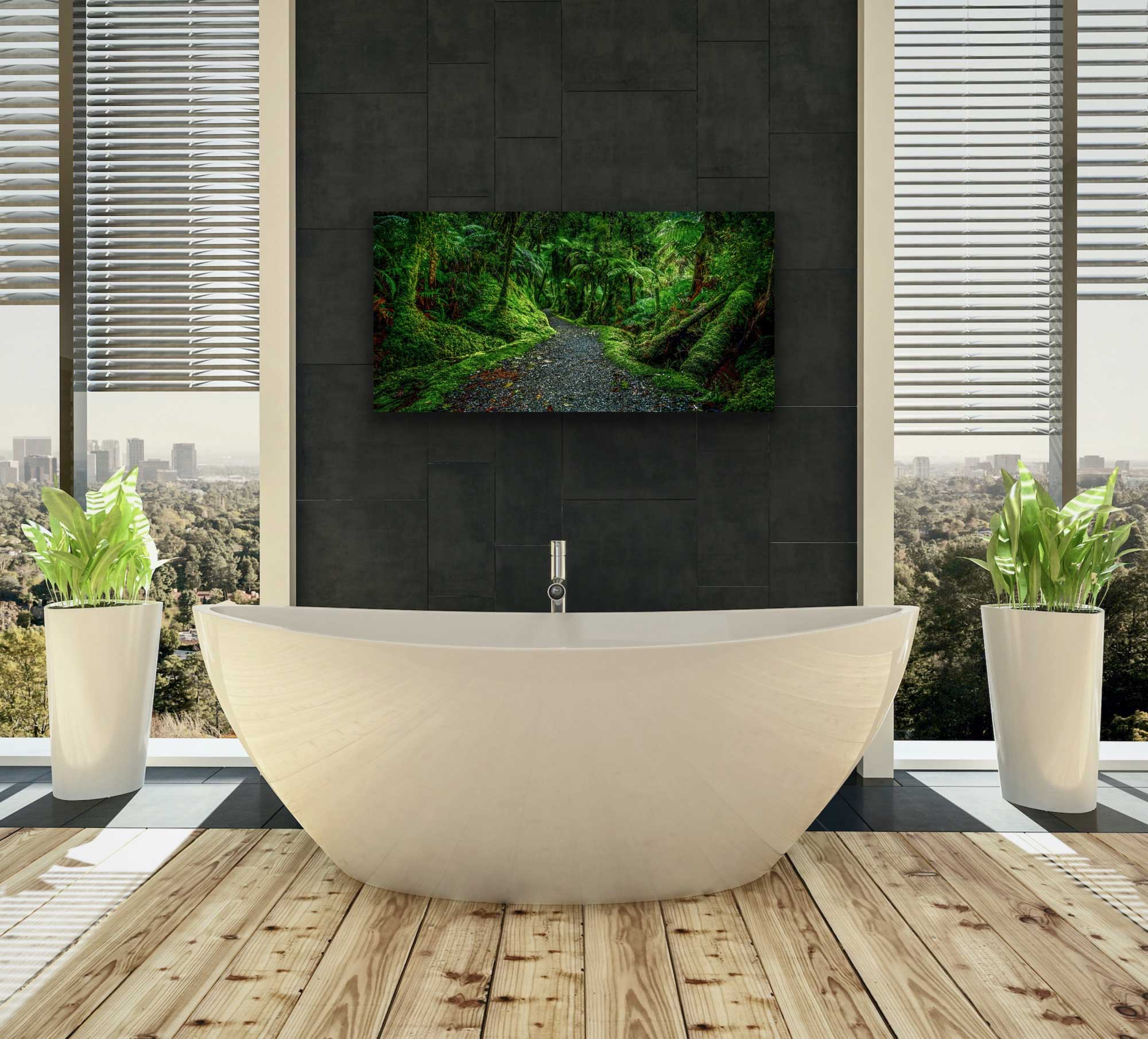 Stunning emerald green Lake Matheson walk photograph on the wall above a bath tub. Beautiful affordable artwork for sale.