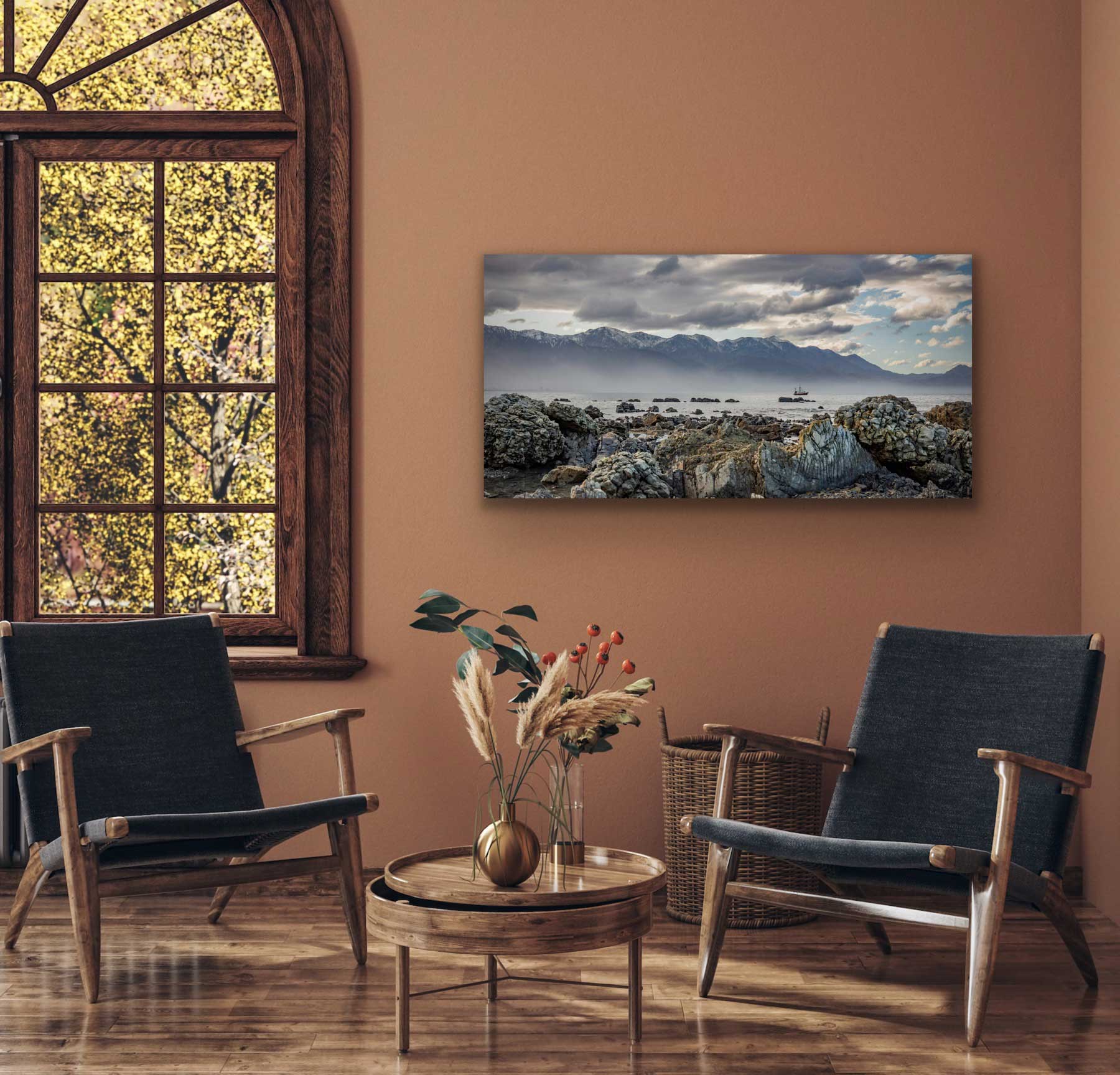 Rugged Kaikoura landscape photograph in situ. What will this artwork look like in my home? Hung on wall above sitting area. NZ interior design photography.